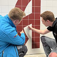 ARDEX: Bereit für die Weltmeisterschaft 2022: Fliesen-Nationalmannschaft trainierte bei Ardex