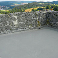 Triflex: Ein Schutzmantel für den Bergfried