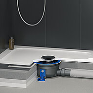 Dallmer: Flexibler Ablauf für Mineralguss-Duschwannen