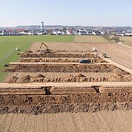 HeidelbergCement: Feldversuch mit Heidelberger Bettungssand