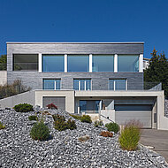 Rathscheck: Eine Schieferfassade für das Holzhaus