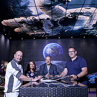 Caparol: Flippern zwischen Mond und Erde